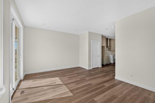 138 Starling Boulevard Nw, Calgary, AB - Indoor Photo Showing Other Room
