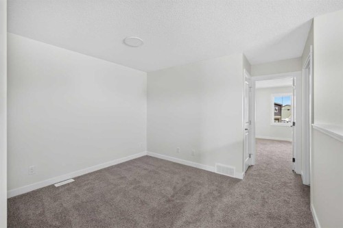 138 Starling Boulevard Nw, Calgary, AB - Indoor Photo Showing Other Room