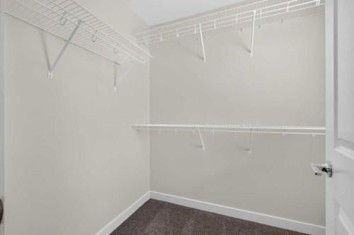 138 Starling Boulevard Nw, Calgary, AB - Indoor With Storage