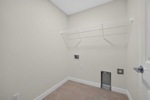 138 Starling Boulevard Nw, Calgary, AB - Indoor With Storage