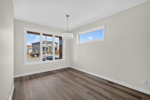 138 Starling Boulevard Nw, Calgary, AB - Indoor Photo Showing Other Room