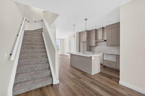 138 Starling Boulevard Nw, Calgary, AB - Indoor Photo Showing Kitchen