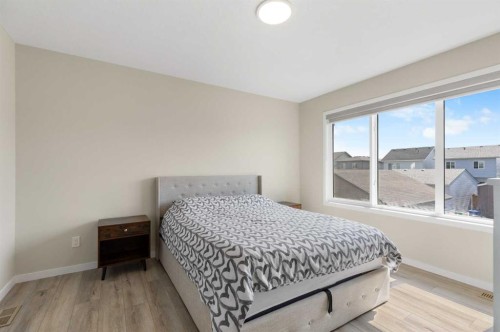 239 Vista Road, Crossfield, AB - Indoor Photo Showing Bedroom