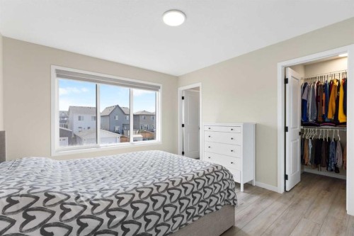 239 Vista Road, Crossfield, AB - Indoor Photo Showing Bedroom