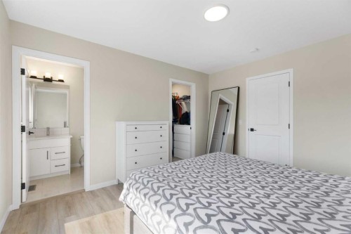 239 Vista Road, Crossfield, AB - Indoor Photo Showing Bedroom