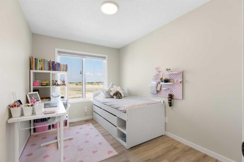 239 Vista Road, Crossfield, AB - Indoor Photo Showing Bedroom