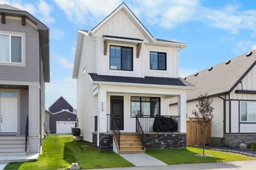 239 Vista Road, Crossfield, AB - Outdoor With Facade