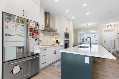 239 Vista Road, Crossfield, AB - Indoor Photo Showing Kitchen With Upgraded Kitchen