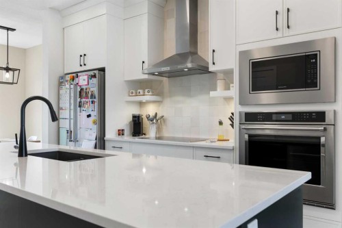 239 Vista Road, Crossfield, AB - Indoor Photo Showing Kitchen With Upgraded Kitchen