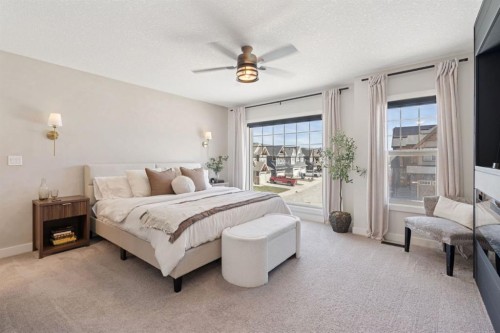 206 Riviera View, Cochrane, AB - Indoor Photo Showing Bedroom
