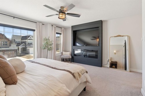 206 Riviera View, Cochrane, AB - Indoor Photo Showing Bedroom