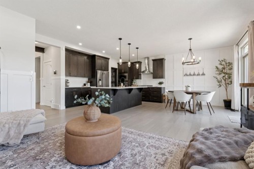 206 Riviera View, Cochrane, AB - Indoor Photo Showing Living Room