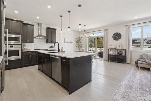 206 Riviera View, Cochrane, AB - Indoor Photo Showing Kitchen With Upgraded Kitchen