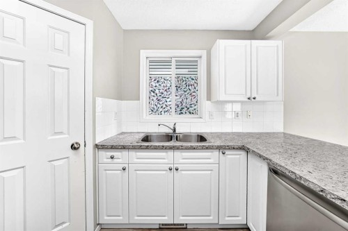 87 Citadel Peak Circle Nw, Calgary, AB - Indoor Photo Showing Kitchen With Double Sink