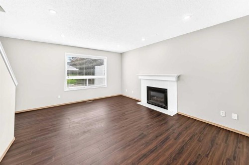 87 Citadel Peak Circle Nw, Calgary, AB - Indoor Photo Showing Living Room With Fireplace