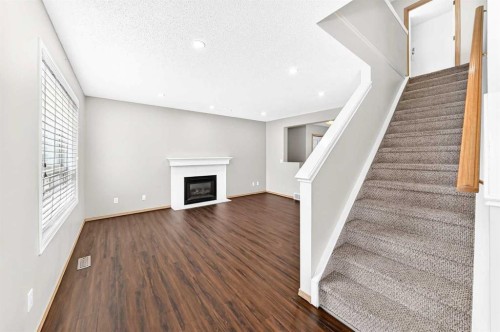 87 Citadel Peak Circle Nw, Calgary, AB - Indoor With Fireplace