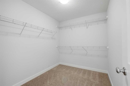 71 Belvedere Green Se, Calgary, AB - Indoor With Storage