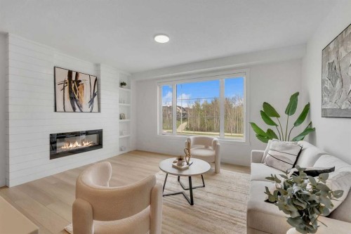 203-8850 48 Street Ne, Calgary, AB - Indoor Photo Showing Living Room With Fireplace