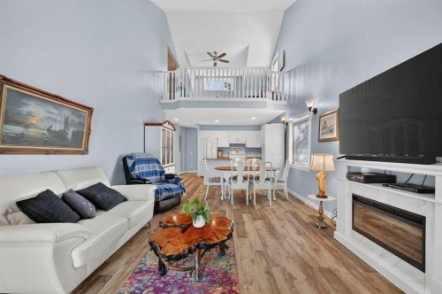 61 Somervale Point Sw, Calgary, AB - Indoor Photo Showing Living Room With Fireplace