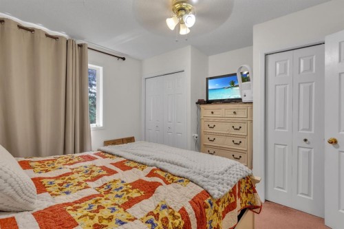 36 Dovista Court Se, Calgary, AB - Indoor Photo Showing Bedroom