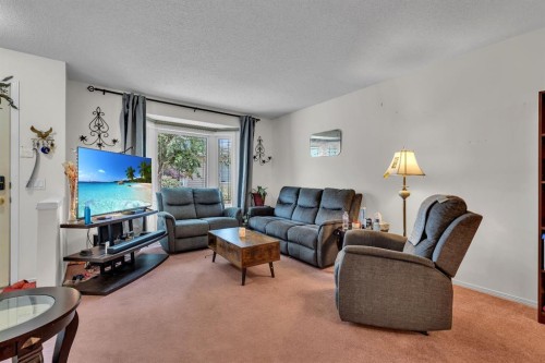 36 Dovista Court Se, Calgary, AB - Indoor Photo Showing Living Room