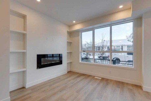 2122 7 Street Nw, Calgary, AB - Indoor Photo Showing Living Room With Fireplace
