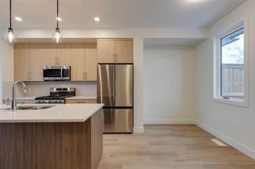 2122 7 Street Nw, Calgary, AB - Indoor Photo Showing Kitchen With Stainless Steel Kitchen With Double Sink With Upgraded Kitchen