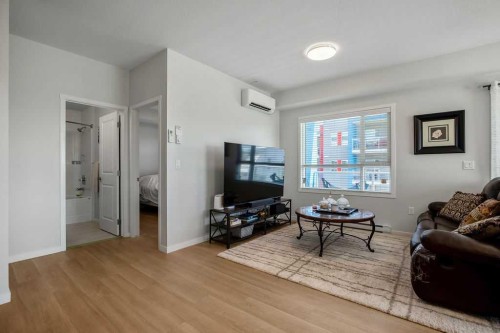 2313-19489 Main Street Se, Calgary, AB - Indoor Photo Showing Living Room