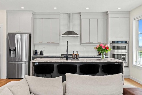 105 Sovereign Common Sw, Calgary, AB - Indoor Photo Showing Kitchen With Stainless Steel Kitchen With Upgraded Kitchen