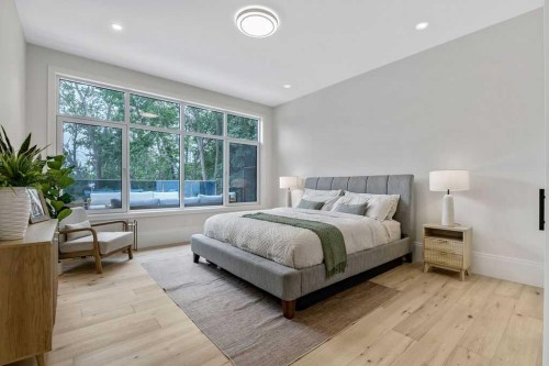 63 Pumpmeadow Crescent Sw, Calgary, AB - Indoor Photo Showing Bedroom