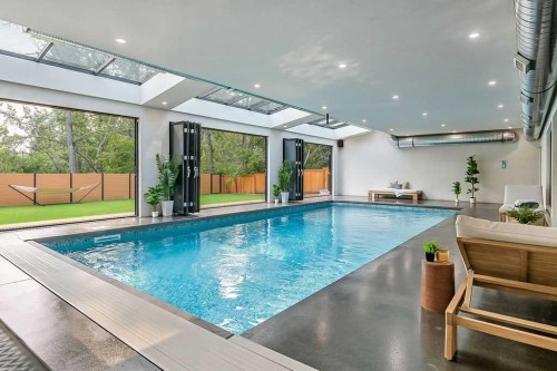 63 Pumpmeadow Crescent Sw, Calgary, AB - Indoor Photo Showing Other Room With In Ground Pool