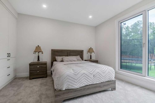 63 Pumpmeadow Crescent Sw, Calgary, AB - Indoor Photo Showing Bedroom