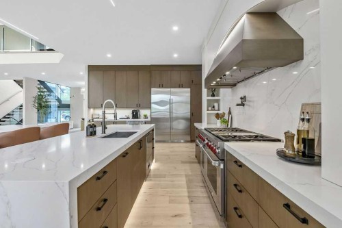 63 Pumpmeadow Crescent Sw, Calgary, AB - Indoor Photo Showing Kitchen With Upgraded Kitchen