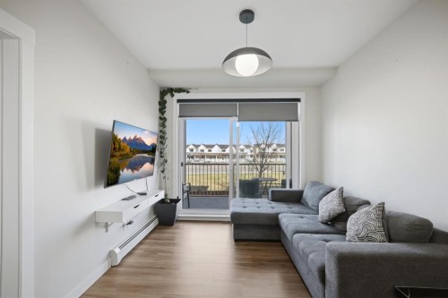 213-400 Auburn Meadows Common Se, Calgary, AB - Indoor Photo Showing Living Room