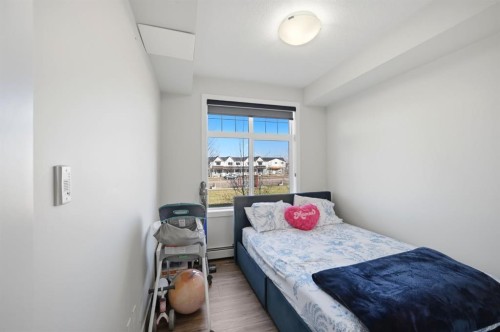 213-400 Auburn Meadows Common Se, Calgary, AB - Indoor Photo Showing Bedroom