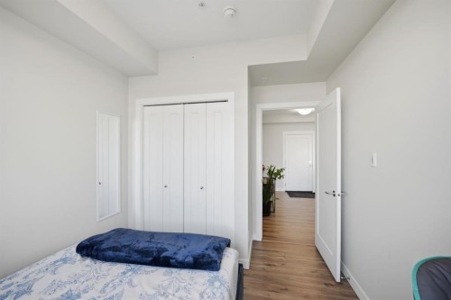 213-400 Auburn Meadows Common Se, Calgary, AB - Indoor Photo Showing Bedroom