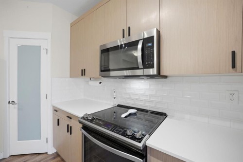 213-400 Auburn Meadows Common Se, Calgary, AB - Indoor Photo Showing Kitchen