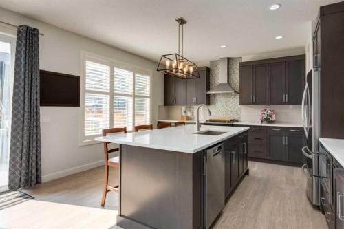 439 Canals Boulevard Sw, Airdrie, AB - Indoor Photo Showing Kitchen With Upgraded Kitchen