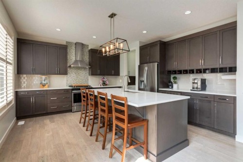 439 Canals Boulevard Sw, Airdrie, AB - Indoor Photo Showing Kitchen With Upgraded Kitchen