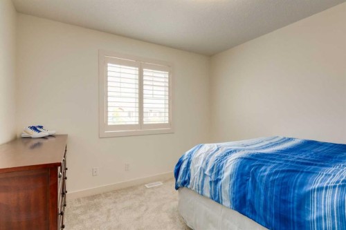 439 Canals Boulevard Sw, Airdrie, AB - Indoor Photo Showing Bedroom