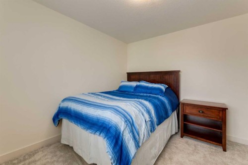439 Canals Boulevard Sw, Airdrie, AB - Indoor Photo Showing Bedroom