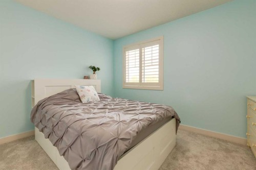 439 Canals Boulevard Sw, Airdrie, AB - Indoor Photo Showing Bedroom