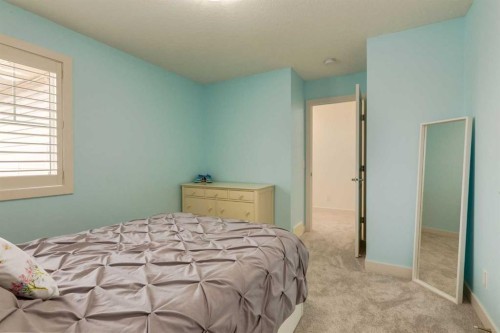 439 Canals Boulevard Sw, Airdrie, AB - Indoor Photo Showing Bedroom