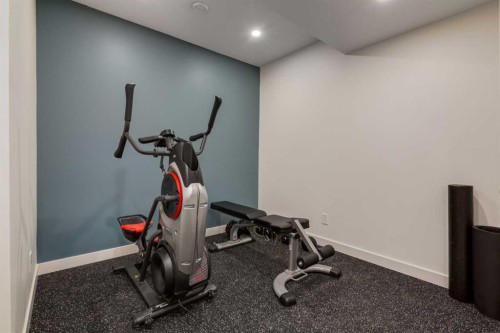 439 Canals Boulevard Sw, Airdrie, AB - Indoor Photo Showing Gym Room