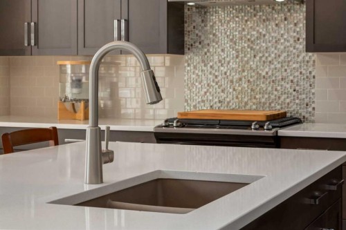439 Canals Boulevard Sw, Airdrie, AB - Indoor Photo Showing Kitchen With Double Sink
