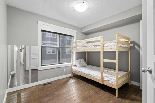 315 Cranford Walk Se, Calgary, AB - Indoor Photo Showing Bedroom