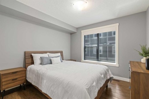 315 Cranford Walk Se, Calgary, AB - Indoor Photo Showing Bedroom