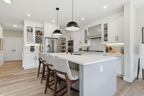 711 Mandalay Link, Carstairs, AB - Indoor Photo Showing Kitchen With Upgraded Kitchen