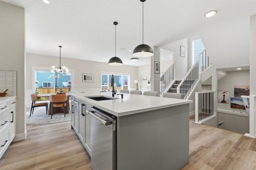 711 Mandalay Link, Carstairs, AB - Indoor Photo Showing Kitchen With Upgraded Kitchen