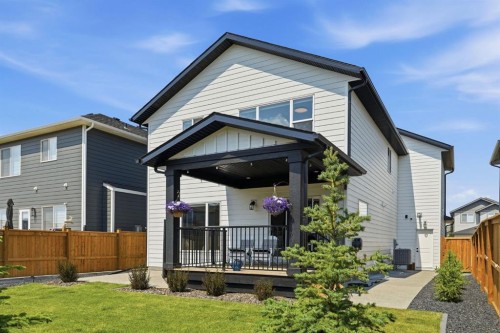 711 Mandalay Link, Carstairs, AB - Outdoor With Deck Patio Veranda